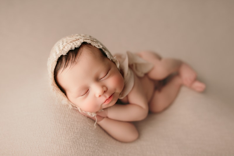 Wellsville NY Family & Newborn Photographer, sleeping baby in a bonnet
