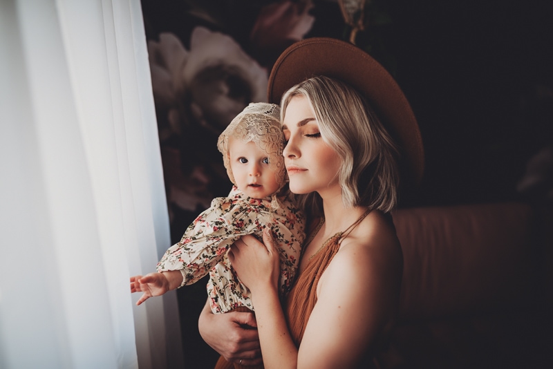 Wellsville NY Family & Newborn Photographer, mother and daughter standing next to a window