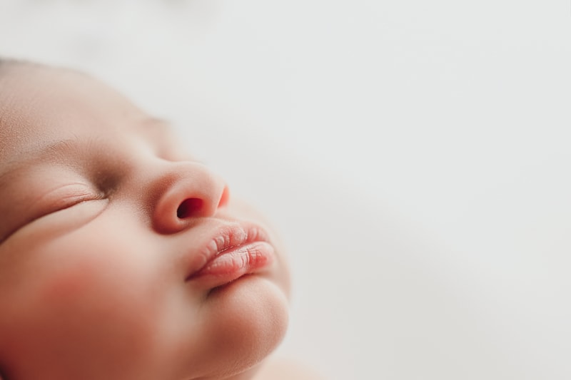 Wellsville NY Family & Newborn Photographer, detail shot of baby's nose and lips
