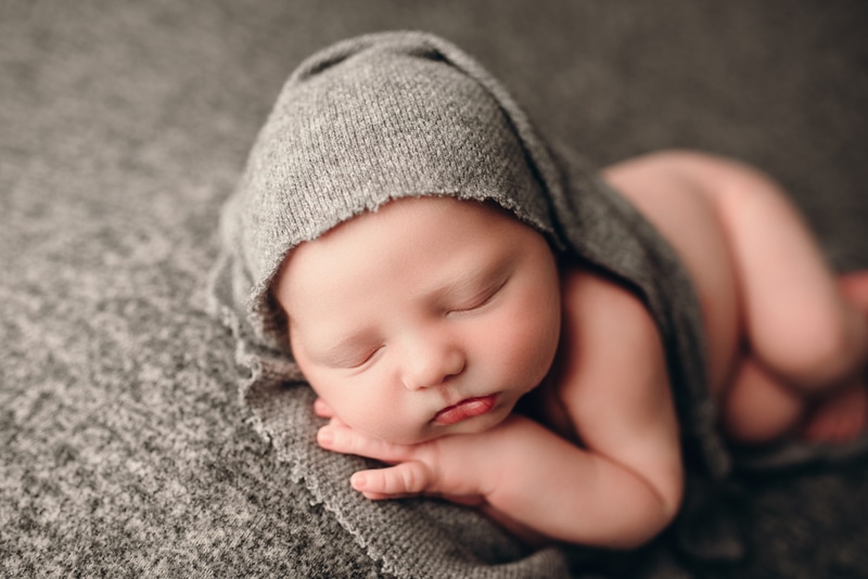 Wellsville NY Family and Newborn Photographer, baby sleep in little grey knit hat